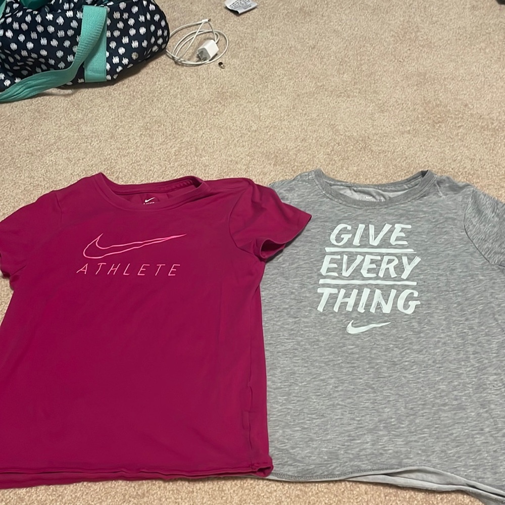 Nike t shirts both in size kids large, barley worn